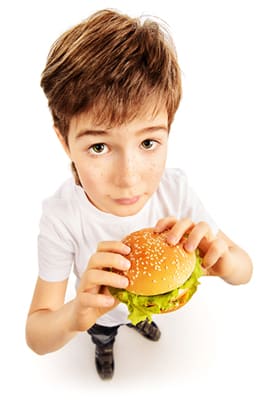 One-Man-Ranch-Kid-Eating-Burger.jpg